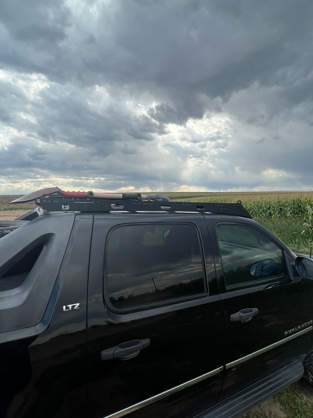 Baseline Overland Chevy Avalanche Roof Rack Shovel Quick Fists
