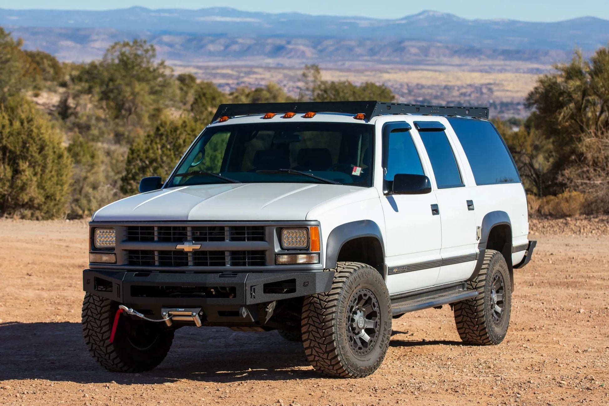 1992-1999 Chevrolet Suburban with roof rack  and Winch Bumper from Baseline Overland.