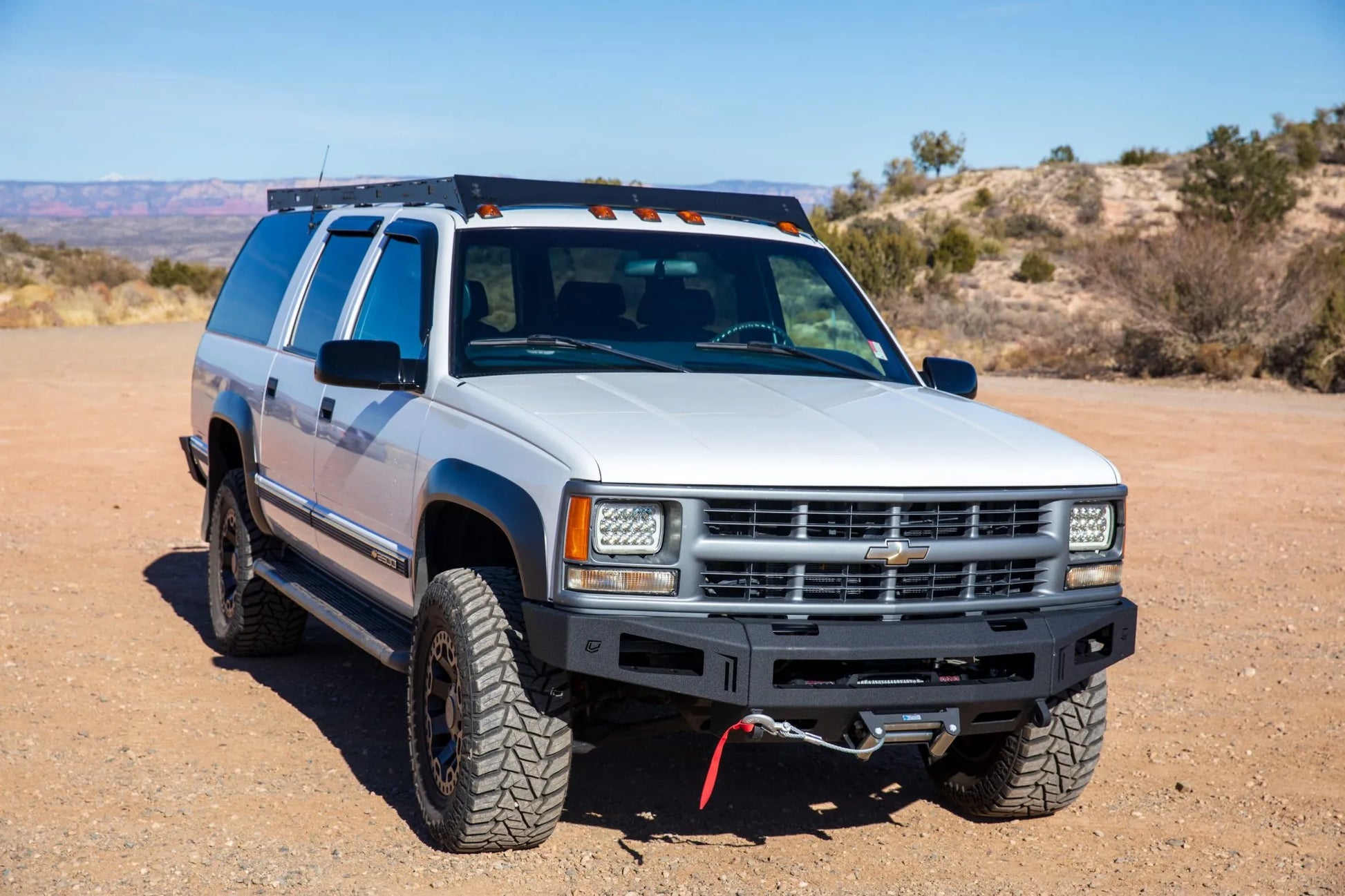 1992-1999 Chevrolet Suburban with roof rack  and Winch Bumper from Baseline Overland.