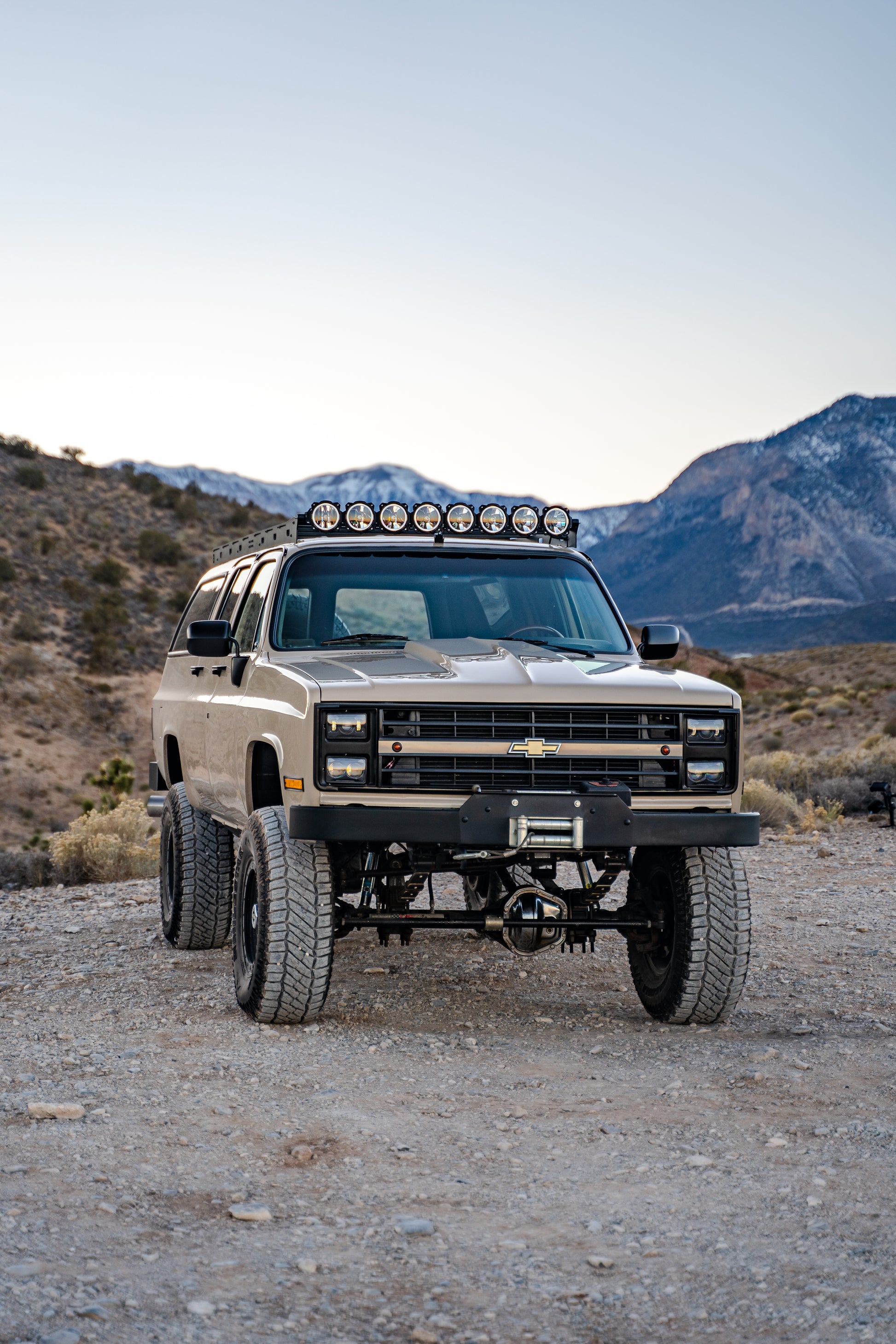 Square Body Suburban with KC Light Bar Baseline Overalnd Roof Rack